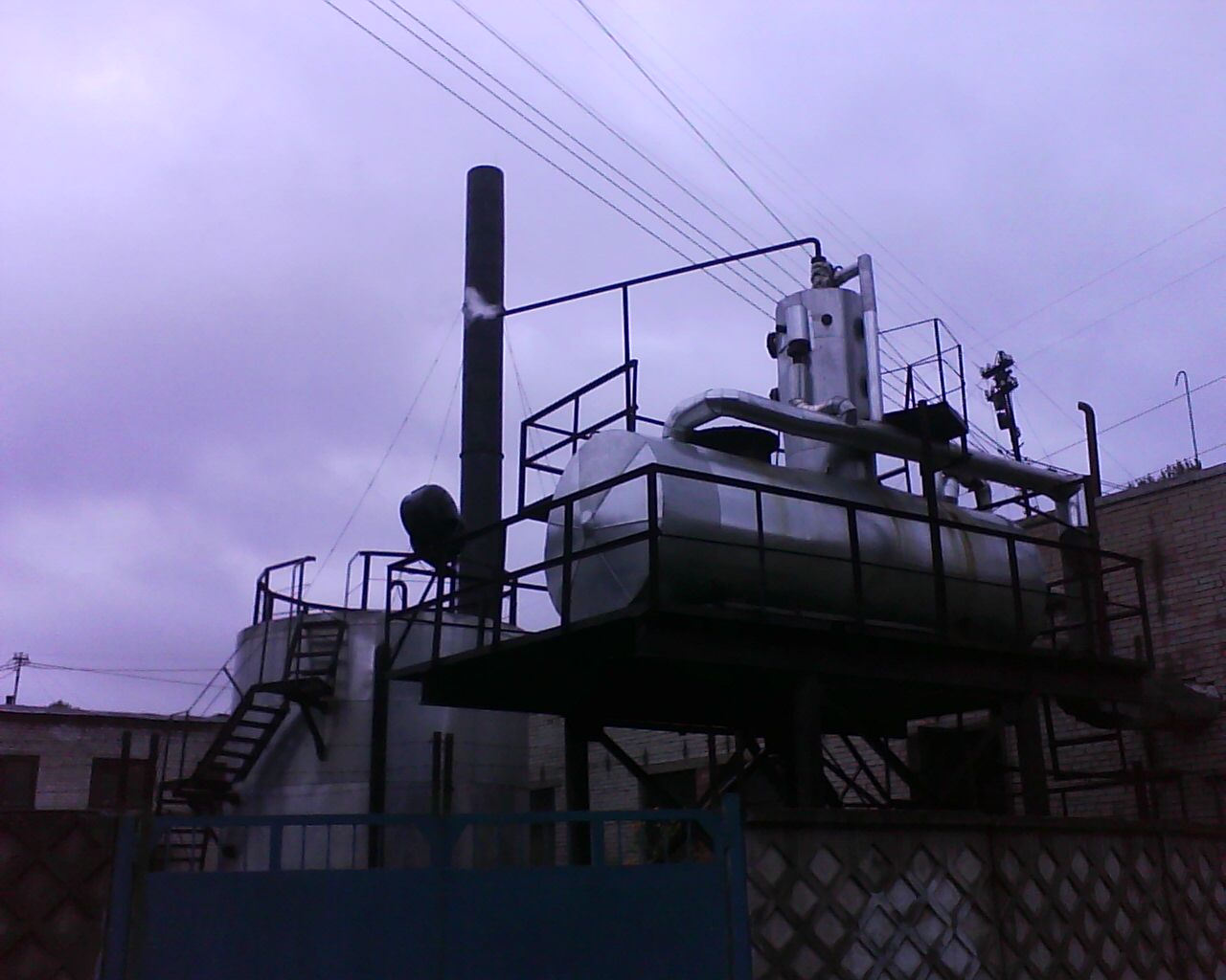 Atmospheric deaerator and feedwater storage vessel at a boiler house photographed in 2011