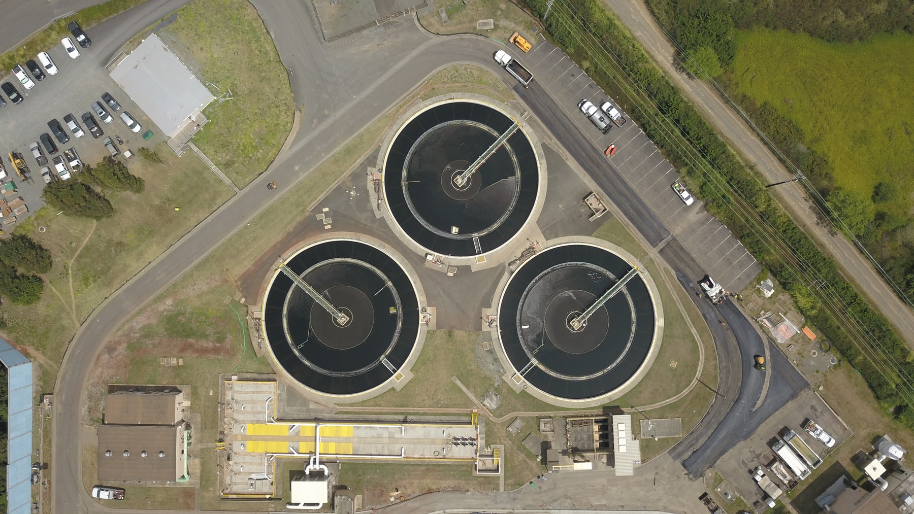 Three circular wastewater clarifiers at Kailua photographed from above in 2018